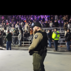 A security guard demonstrating skills during training, showcasing qualifications and duties required for security guard services.